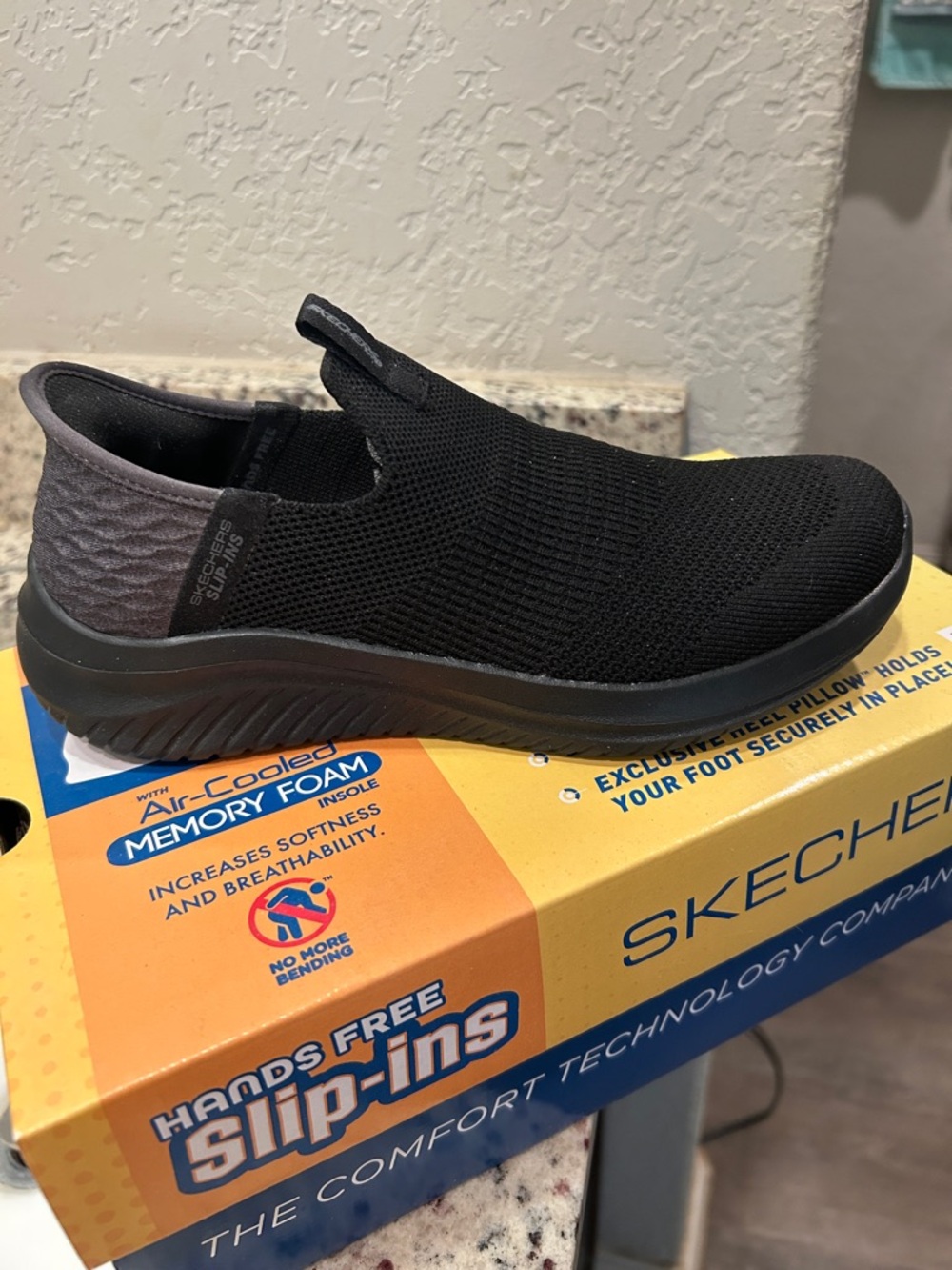 Skechers Black Slip-On Knit Loafer with Gray Heel